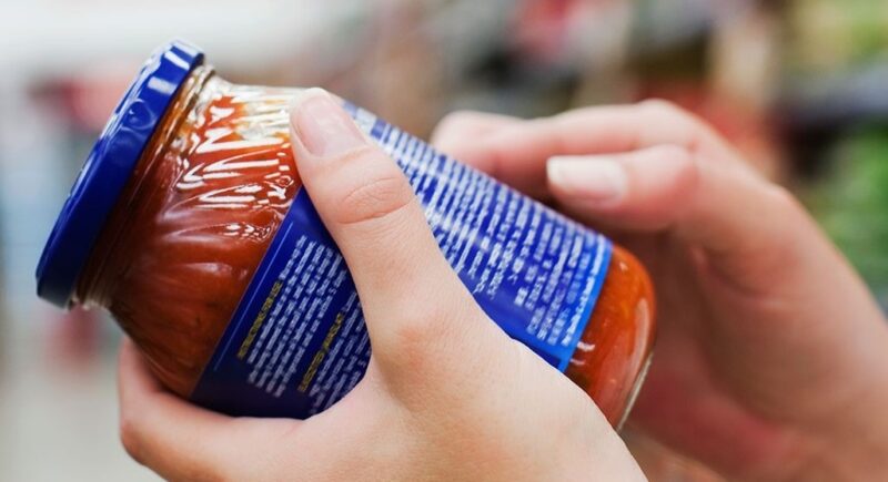 A person looking at labelling and the low FODMAP diet