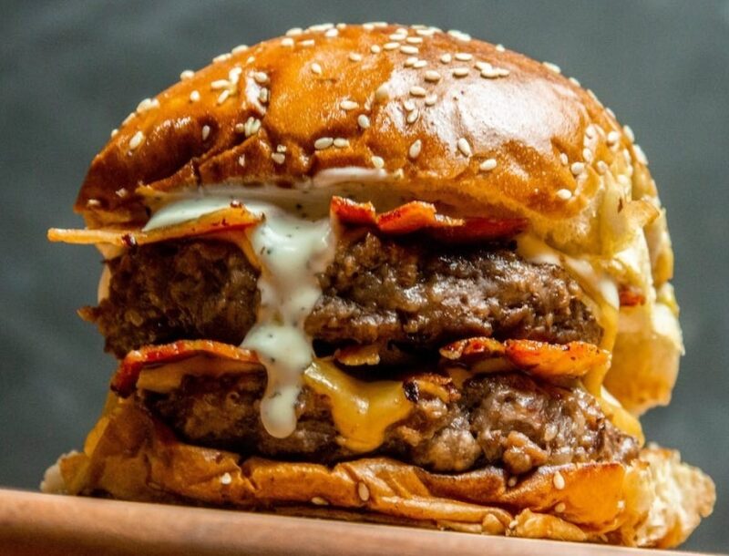 Image showing a burger in a bun (UPFs and IBS symptoms)