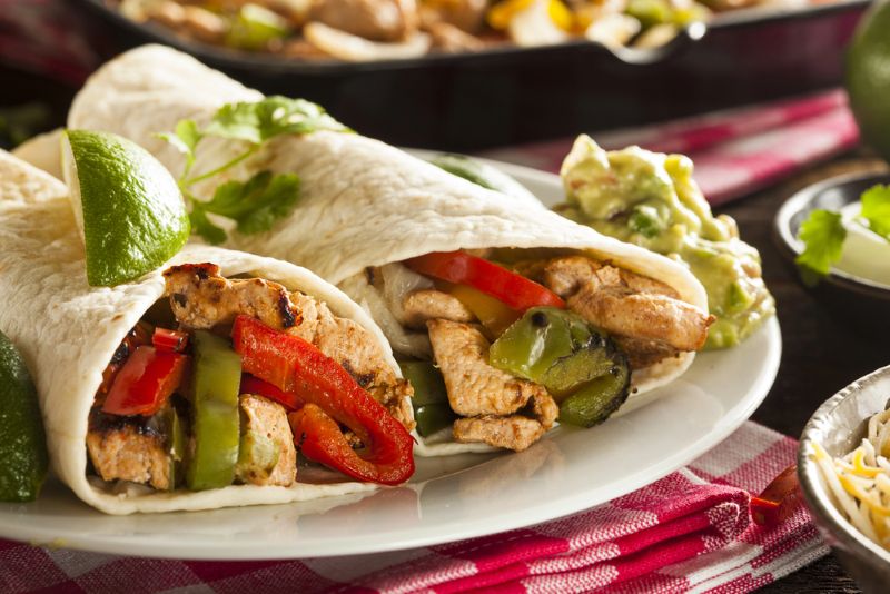 A plate of 2 low FODMAP Chicken Fajitas