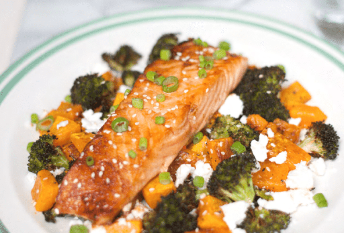 Image showing a peice of salmon on a bed of roast vegetables